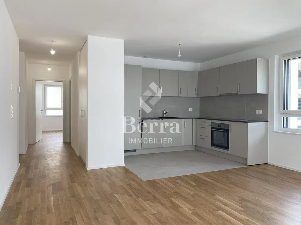 Kitchen; kitchen appliances, wood floor, natural light, renovated