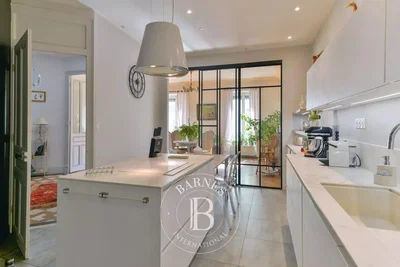 Kitchen; kitchen appliances, natural light, modern style, tile floor, renovated