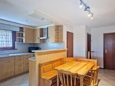 Kitchen; kitchen appliances, tile floor, natural light