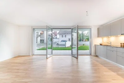 Kitchen; kitchen appliances, wood floor, natural light