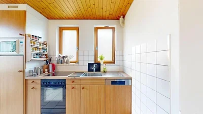 Kitchen; kitchen appliances, wood floor, natural light