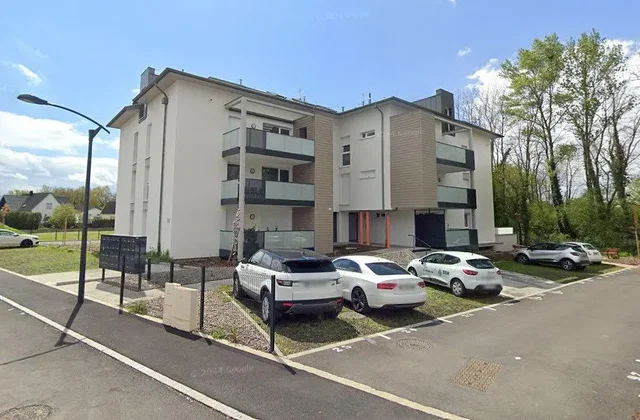 House and surroundings; view