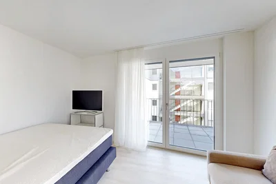 Bedroom; natural light, tile floor