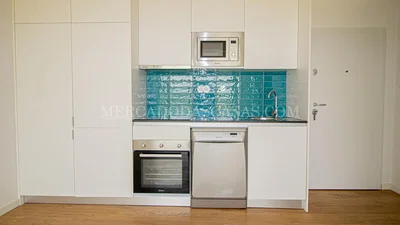 Kitchen; kitchen appliances, wood floor, natural light