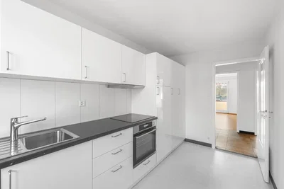 Kitchen; kitchen appliances, tile floor, natural light