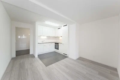 Kitchen; kitchen appliances, tile floor, natural light, renovated