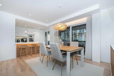 Living room; kitchen appliances, wood floor, natural light, modern style
