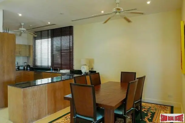 Kitchen; kitchen appliances, wood floor, natural light