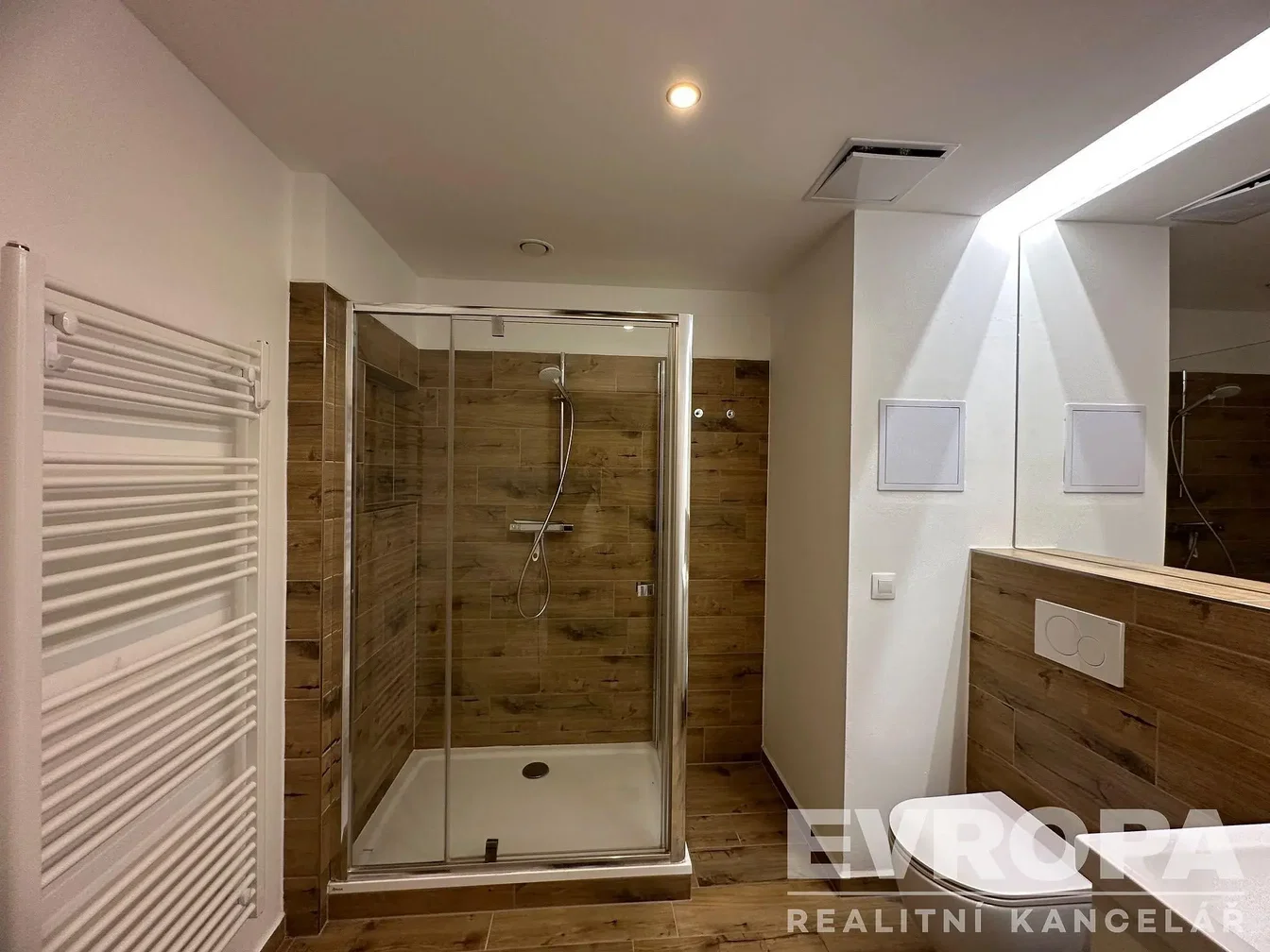 Toilet; renovated, wood floor, natural light
