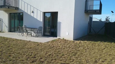 House and surroundings; natural light