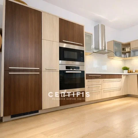 Kitchen; kitchen appliances, wood floor, renovated, natural light