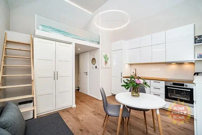 Kitchen; kitchen appliances, wood floor, natural light, modern style