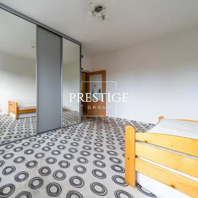 Bedroom; wood floor, tile floor, natural light