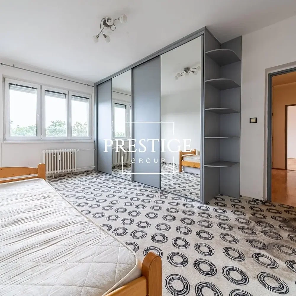 Bedroom; natural light, wood floor