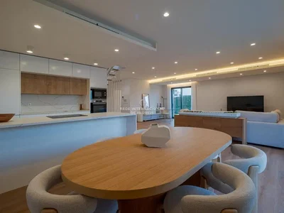 Kitchen; kitchen appliances, wood floor, natural light, modern style