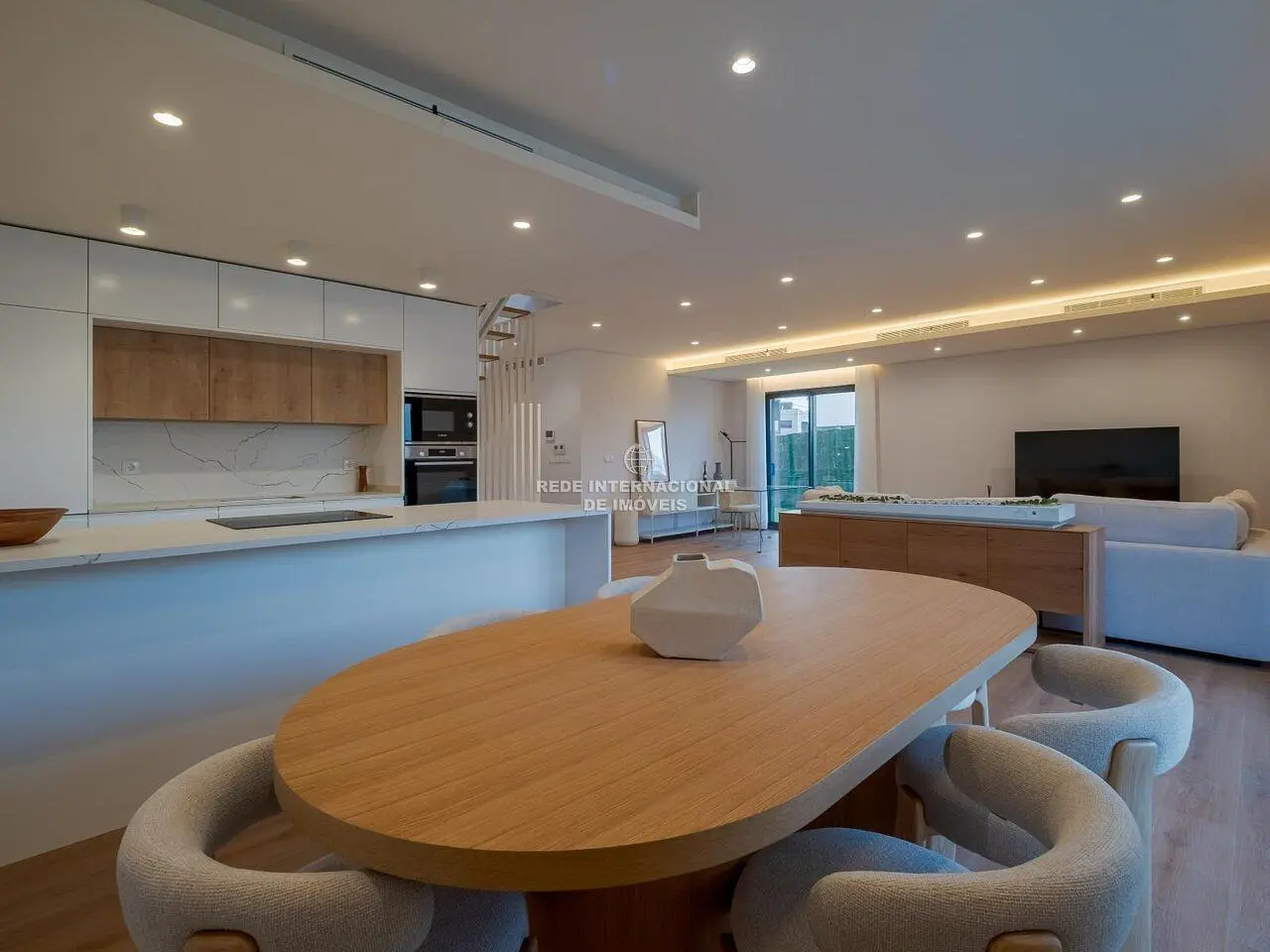 Kitchen; kitchen appliances, wood floor, natural light, modern style