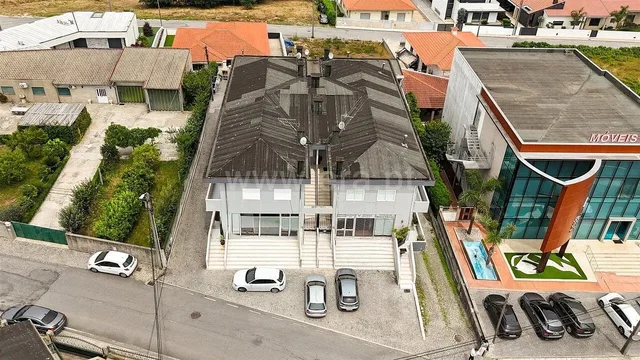 House and surroundings; view