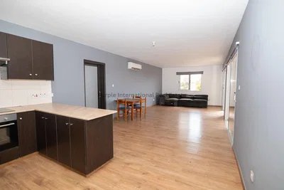 Kitchen; kitchen appliances, wood floor, natural light