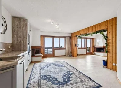 Living room; natural light, wood beams, fireplace