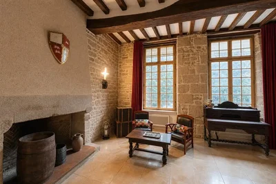 Living room; fireplace, rustic style, wood beams, natural light