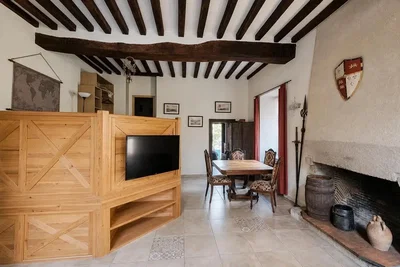 Living room; wood beams, fireplace, rustic style, wood floor