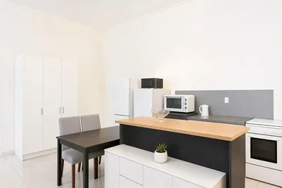 Kitchen; kitchen appliances, tile floor, natural light, renovated, modern style