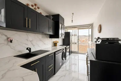 Kitchen; kitchen appliances, tile floor, natural light, view