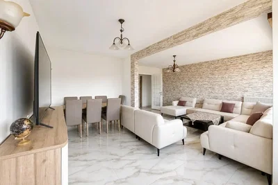 Living room; tile floor, natural light, modern style