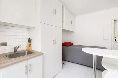 Kitchen; kitchen appliances, tile floor, natural light, modern style