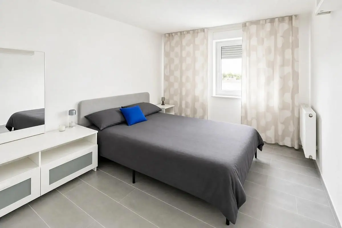 Bedroom; tile floor, natural light