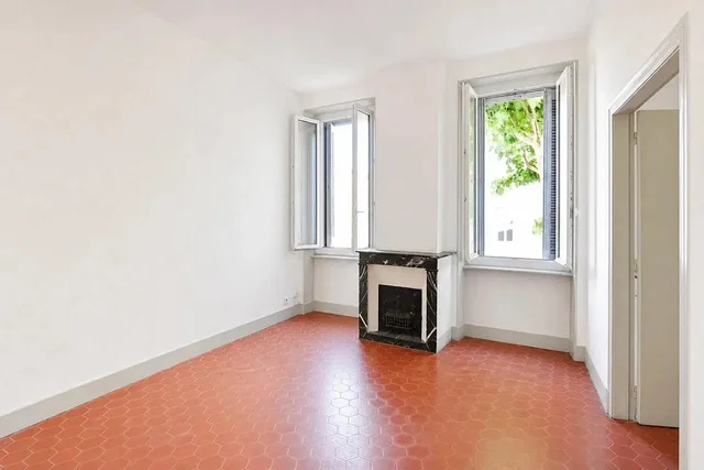 Living room; tile floor, fireplace, natural light
