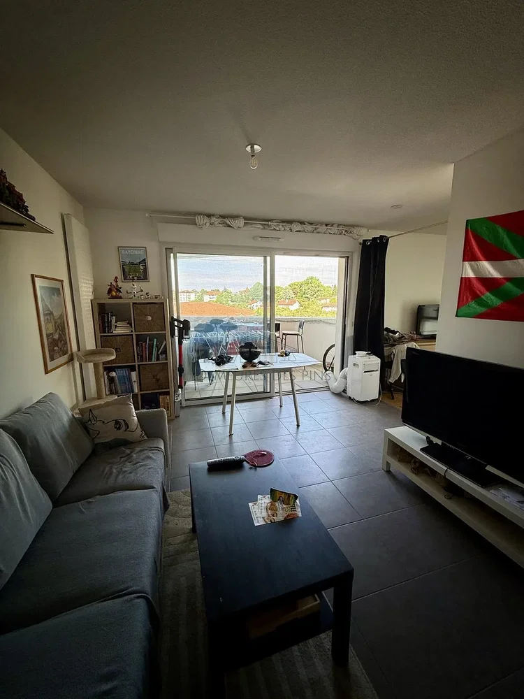 Living room; natural light, tile floor, view