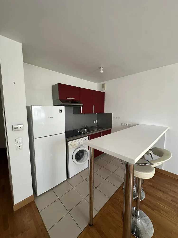 Kitchen; kitchen appliances, tile floor, wood floor