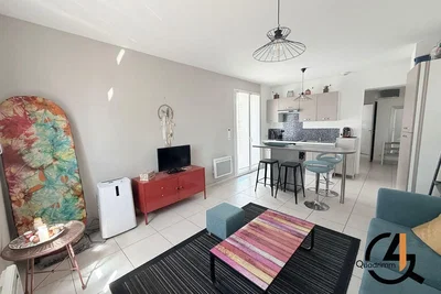 Living room; natural light, tile floor, modern style