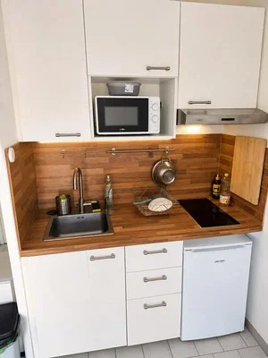Küche; küchengeräte, holzboden