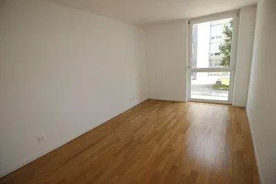 Camera da letto; pavimento in legno, luce naturale