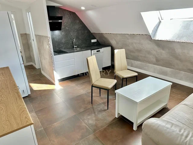 Living room; tile floor, natural light, kitchen appliances