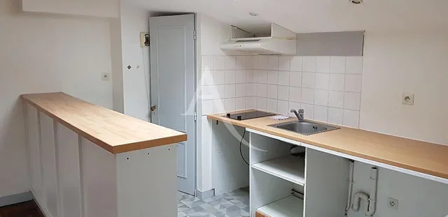 Kitchen; tile floor, needs renovation, natural light