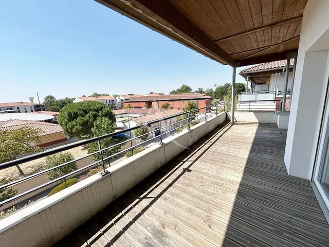 Balcony; wood floor, natural light, view