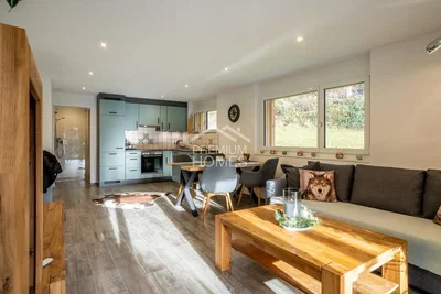 Living room; natural light, wood floor, modern style, kitchen appliances
