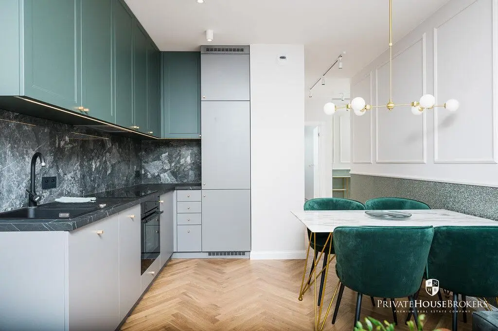 Kitchen; kitchen appliances, wood floor, renovated, natural light, modern style