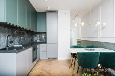 Kitchen; kitchen appliances, wood floor, renovated, natural light, modern style