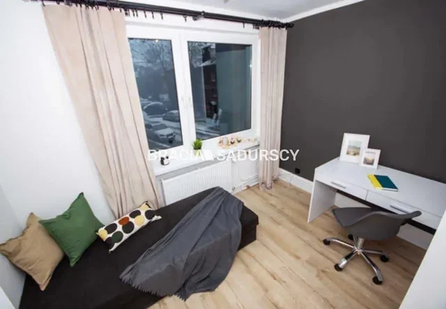 Bedroom; wood floor, natural light