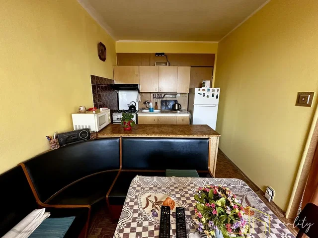 Kitchen; kitchen appliances, tile floor, needs renovation, natural light