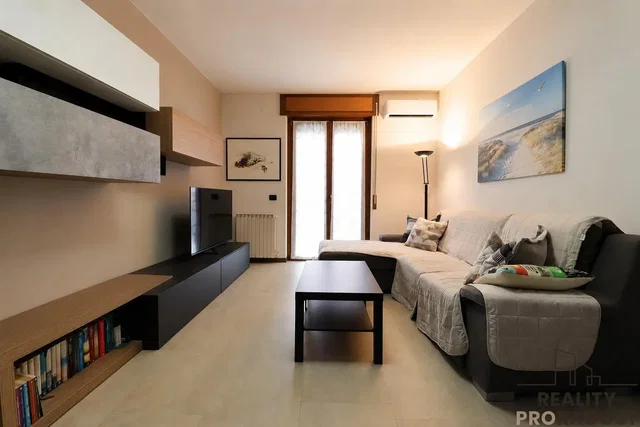 Living room; tile floor, natural light, modern style