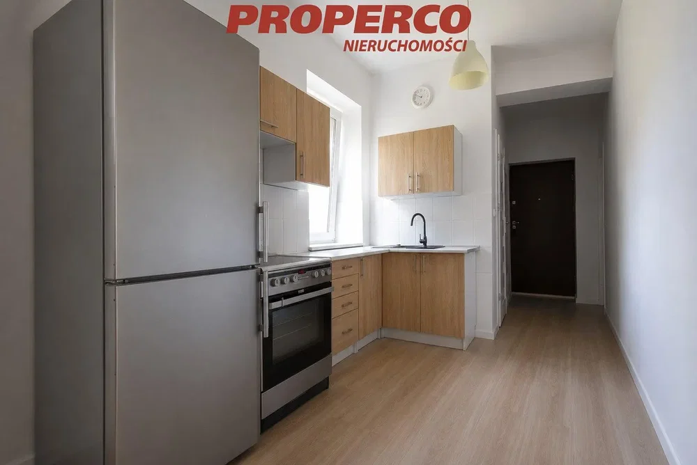 Kitchen; kitchen appliances, wood floor, natural light, modern style
