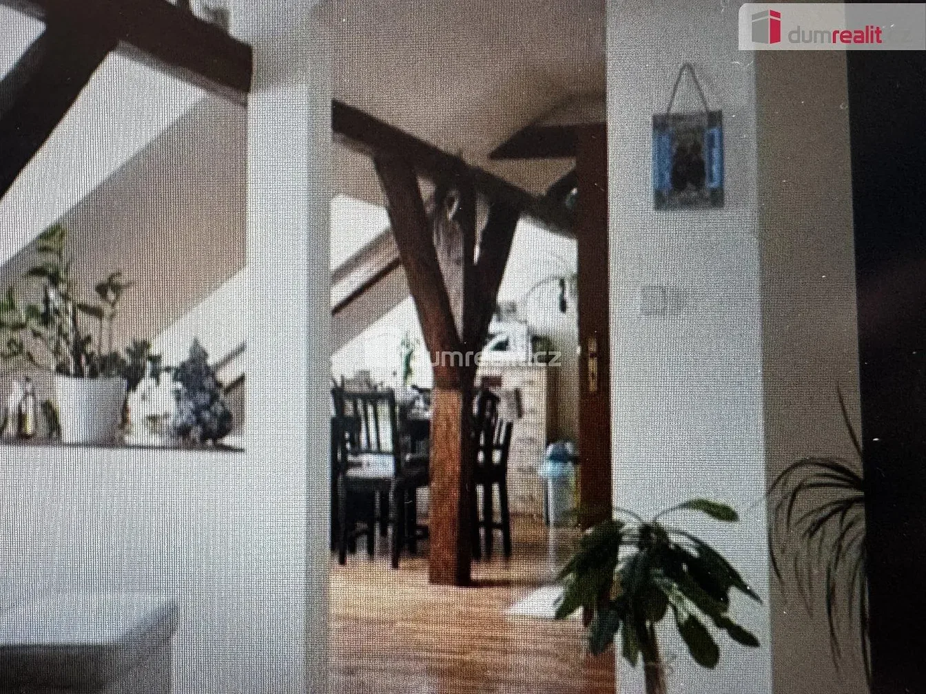 Living room; wood beams, wood floor, natural light