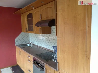 Kitchen; kitchen appliances, tile floor, needs renovation