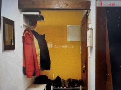 Cloakroom; wood beams, needs renovation