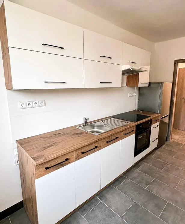 Kitchen; kitchen appliances, tile floor, renovated, natural light